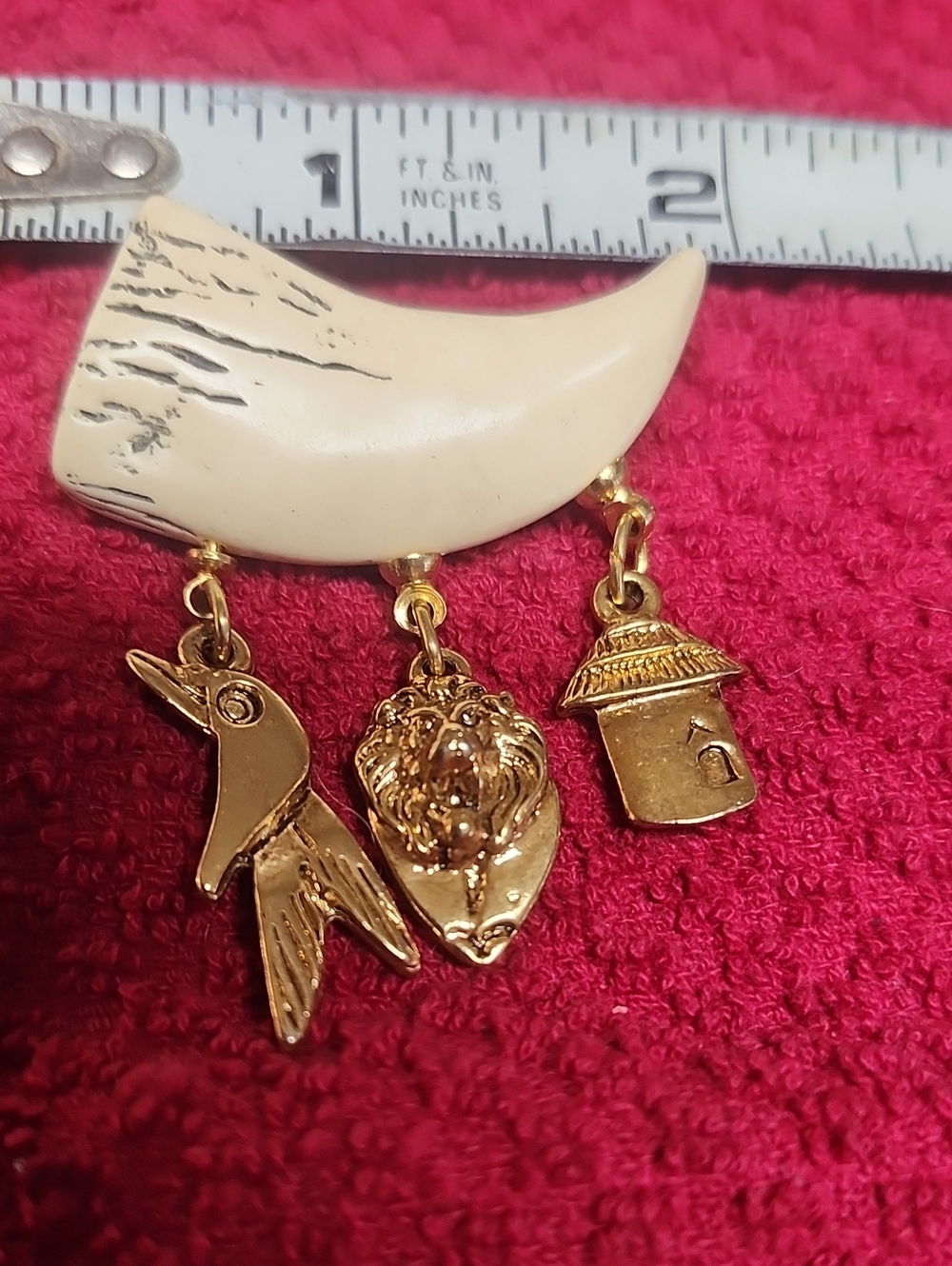 Gold Charm Brooch with Ivory Crescent and Three Dangling Charms